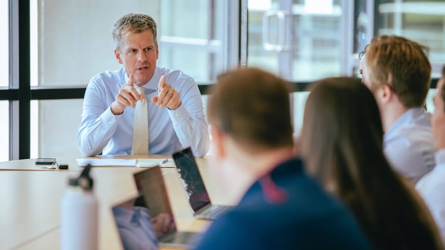 Quinnipiac Law students gain insights from a lawyer during a workshop.