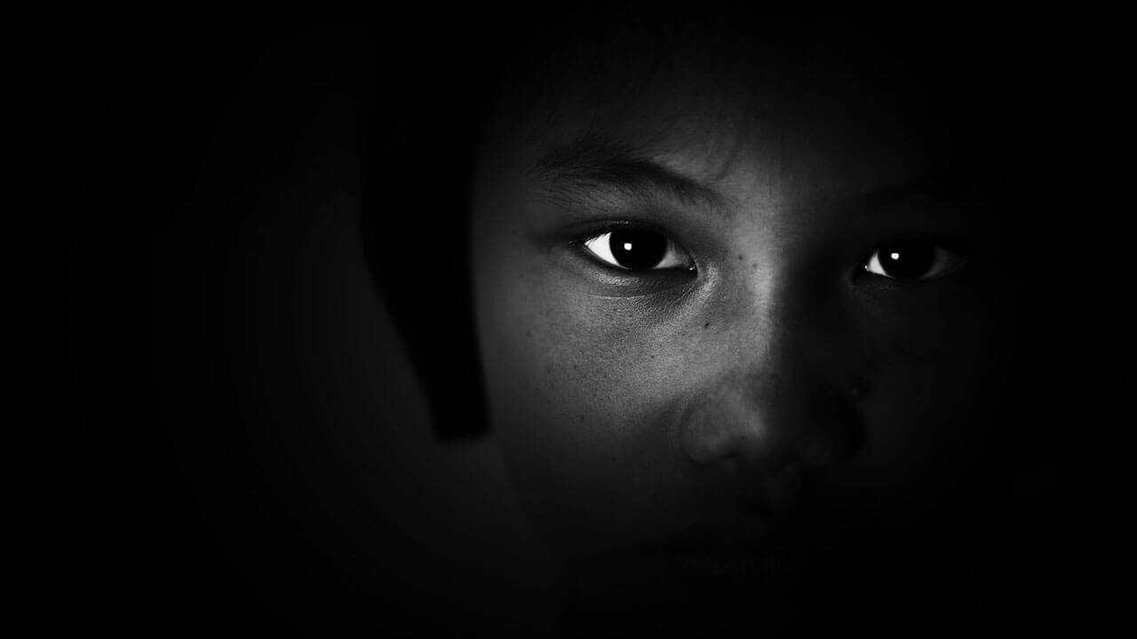 Child in shadows